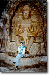   Jasmine Patel with a carving of the marriage of Shiva & Parvati in the Ellora caves. Avrangabad, India.